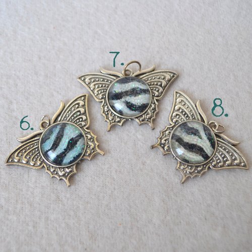 Butterfly pendant - Zebra, Green and pastel Rainbow Faux stones
