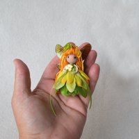 Magical yellow and green fairy doll