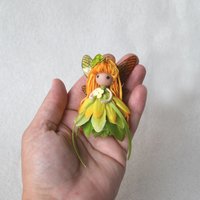 Magical yellow and green fairy doll