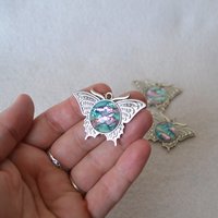 Butterfly pendant - Zebra, Green and pastel Rainbow Faux stones