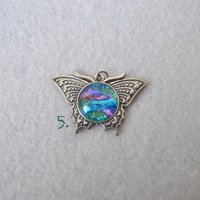 Butterfly pendant - Zebra, Green and pastel Rainbow Faux stones